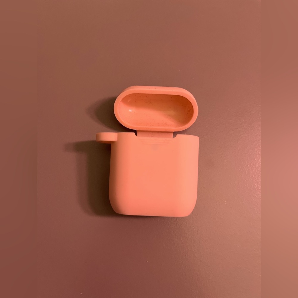 Apple airpod generation 1. Soft pink case with charging hole